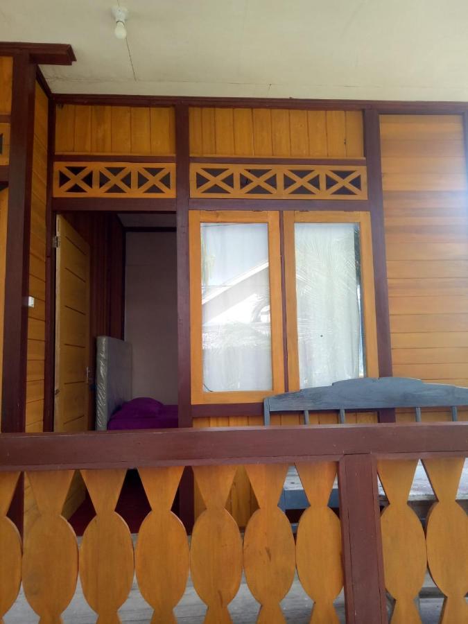 Novita Homestay Бунакен Екстер'єр фото