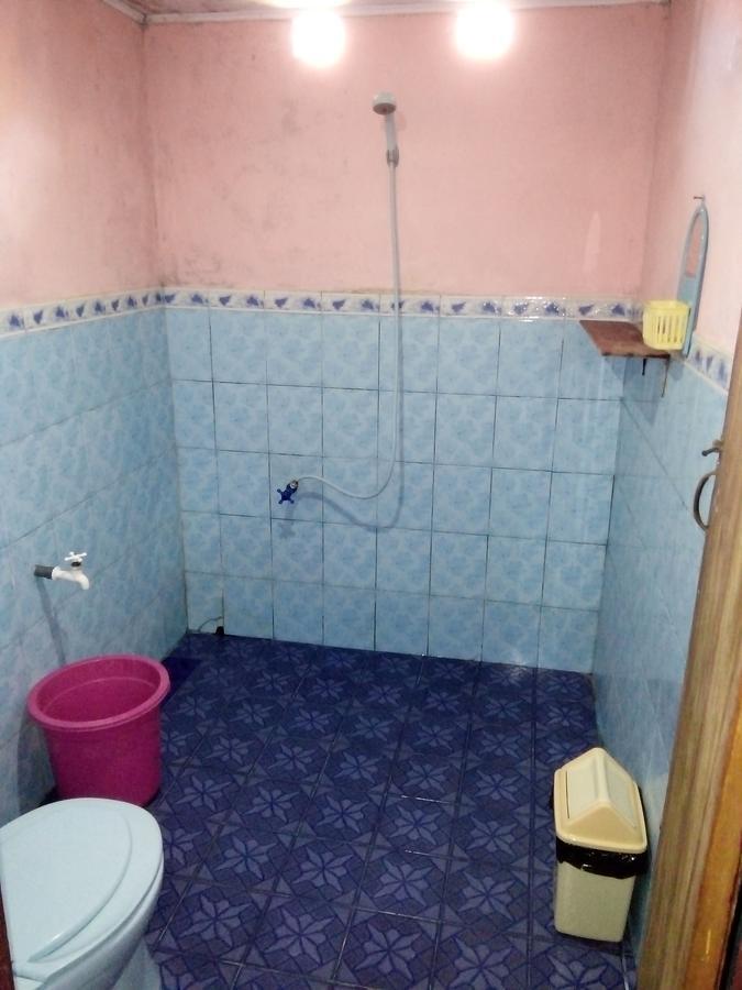 Novita Homestay Бунакен Екстер'єр фото