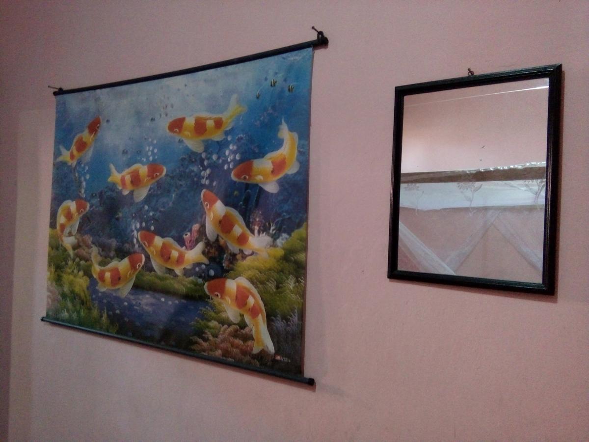 Novita Homestay Бунакен Екстер'єр фото