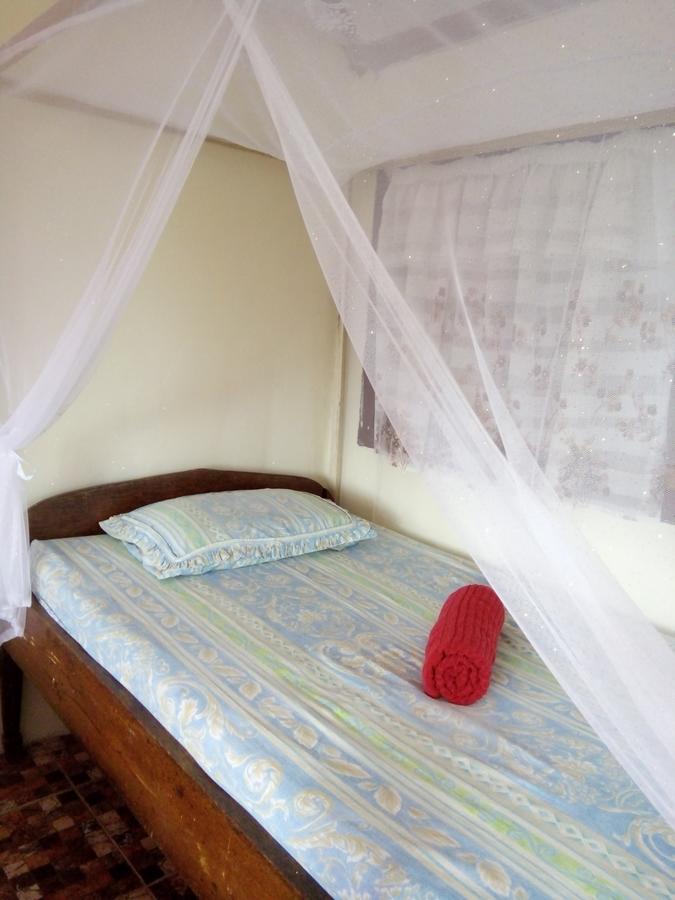 Novita Homestay Бунакен Екстер'єр фото