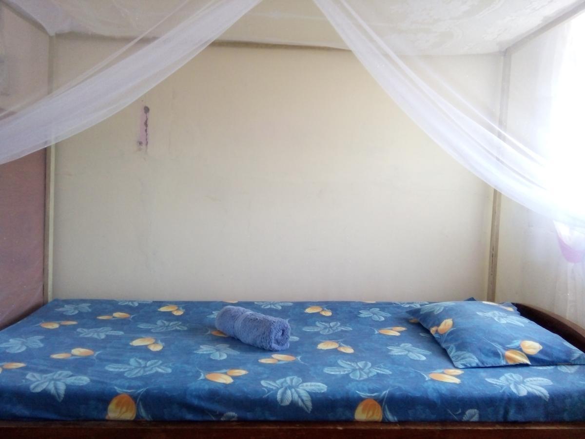 Novita Homestay Бунакен Екстер'єр фото