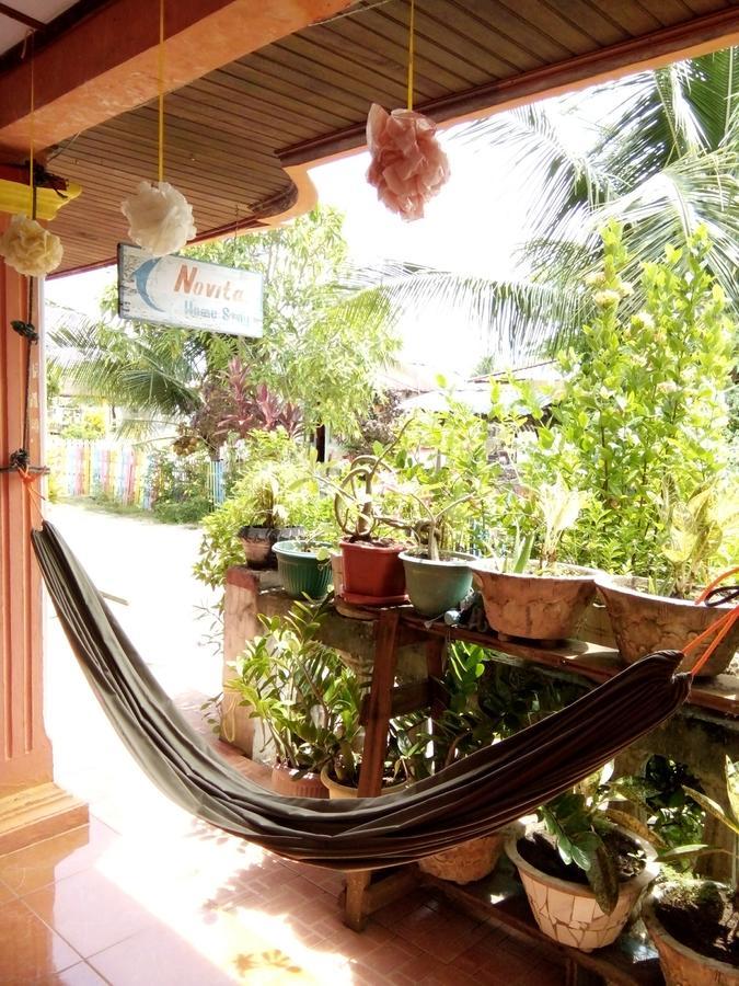 Novita Homestay Бунакен Екстер'єр фото