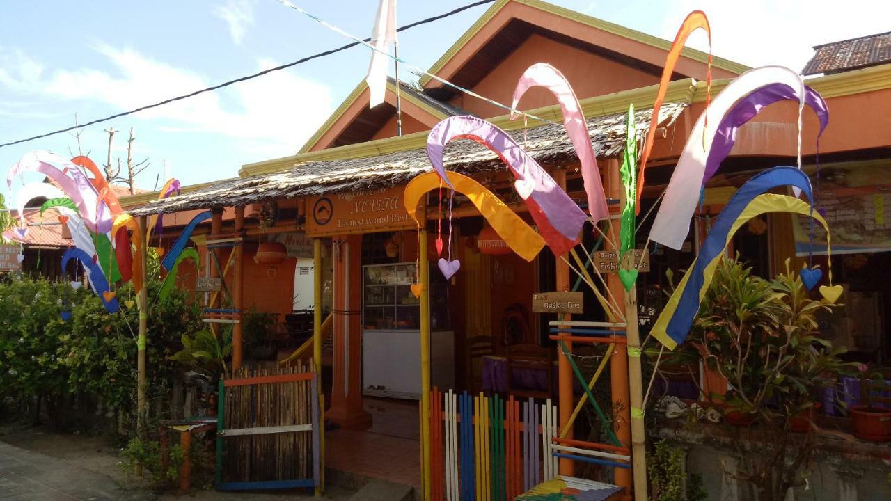 Novita Homestay Бунакен Екстер'єр фото