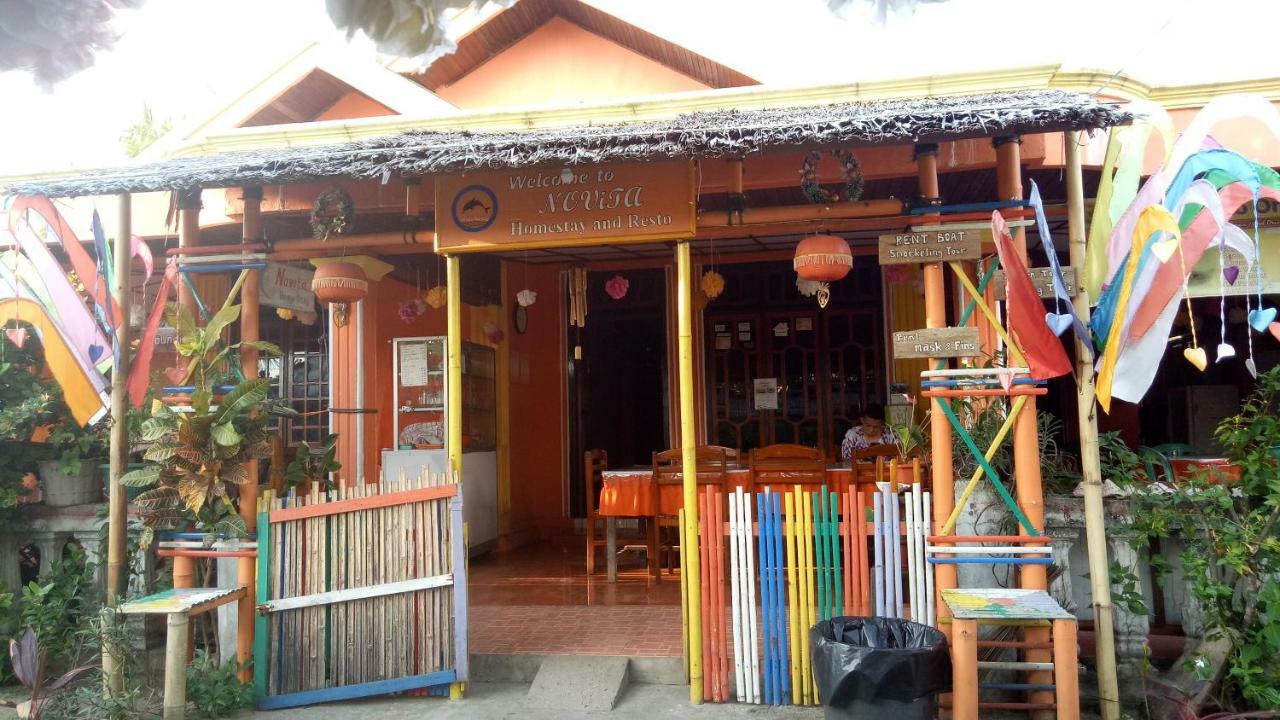 Novita Homestay Бунакен Екстер'єр фото